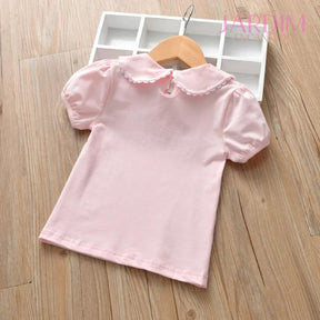 blusa feminina infantil" "blusa infantil com babadinho" "blusa algodão poliéster" "blusa com detalhes em babado" "blusa para meninas com babadinho" "blusa confortável para crianças" "blusa feminina infantil algodão" "blusa infantil moda" "blusa poliéster para meninas" "roupa infantil babadinho
